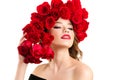 Luxurious young girl with red roses hairstyle Royalty Free Stock Photo