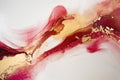 Luxury abstract fluid art painting in alcohol ink technique, mixture of red, yellow and gold paints. Imitation of marble stone cut