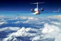 Luxury airplane. Above beautiful clouds.