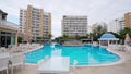 Luxury apartment complex with large pool, tropical setting for upscale living, investment potential, resort lifestyle