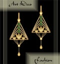 Luxury art deco filigree earrings, jewel with green emerald , antique elegant gold jewelry, fashion in victorian style Royalty Free Stock Photo
