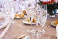 Luxury banquet table setting with crystal glasses