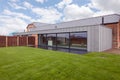 Luxury barn conversion rear facade with cladding