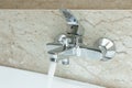 Luxury bath tub and faucet with water Royalty Free Stock Photo