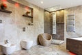 Luxury bathroom with beige tiles