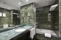 Luxury bathroom in green marble. Decoration hotel home interior Royalty Free Stock Photo