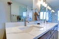 Luxury bathroom interior with blue dual washstand. Royalty Free Stock Photo