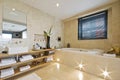 Luxury bathroom with light brown marble