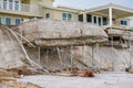 Luxury beach homes collapse under heavy waves caused by Hurricane Nicole Daytona Beach FL Royalty Free Stock Photo