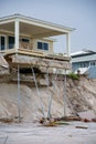 Luxury beach homes collapse under heavy waves caused by Hurricane Nicole Daytona Beach FL Royalty Free Stock Photo