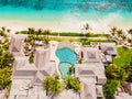 Luxury beach and hotel resort with pool in Mauritius. Beach with palms and ocean. Aerial view Royalty Free Stock Photo