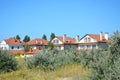 Luxury Beach Houses Sea. Beach House hiding in trees. Royalty Free Stock Photo