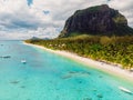 Luxury beach with Le Morne mountain in Mauritius. Beach with palms and ocean. Aerial view Royalty Free Stock Photo