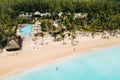 Luxury beach with mountain in Mauritius. Sandy beach with palms and blue ocean. Aerial view Royalty Free Stock Photo
