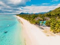 Luxury beach with mountain in Mauritius. Sandy beach with palms and ocean. Aerial view Royalty Free Stock Photo