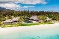 Luxury beach with resort in Mauritius. Sandy beach with palms and blue ocean. Aerial view Royalty Free Stock Photo