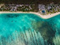 Luxury beach with resorts, palms and ocean in Mauritius. Aerial view Royalty Free Stock Photo