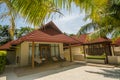 Luxury beautiful cottage on the exotic beach located at the tropical island resort Royalty Free Stock Photo