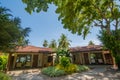 Luxury beautiful cottages on the exotic beach located at the tropical island resort Royalty Free Stock Photo