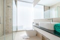 Luxury beautiful interior real bathroom features basin, toilet bowl in the house or home building Royalty Free Stock Photo