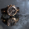 Luxury waterproof watches in water splashes