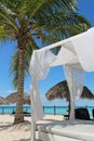 Luxury bed on a tropical beach in the caribbean Royalty Free Stock Photo