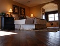Luxury Bedroom with Hardwood Flooring Royalty Free Stock Photo