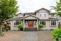 Luxury beige house with a big wooden door Royalty Free Stock Photo