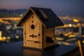 luxury birdhouse with heated floor and bathroom, and view of the city skyline