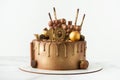Luxury birthday chocolate cake with drips decorated with candies covered with brown and golden frosting