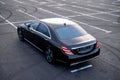 Luxury black car on a parking lot Royalty Free Stock Photo