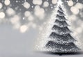 Christmas tree with snowflakes and bokeh on grey background