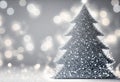 Christmas tree with snowflakes and bokeh on grey background