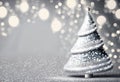 Christmas tree with snowflakes and bokeh on grey background