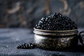 Luxury black sturgeon caviar, antique bowl, dark background