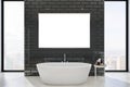 Luxury black tile, concrete bathroom interior with empty white mock up banner, bathtub, panoramic city view, daylight and other Royalty Free Stock Photo