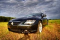 Luxury bmw cabriolet in rural scene, hdr Royalty Free Stock Photo