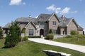 Luxury brick home with arched doorway Royalty Free Stock Photo