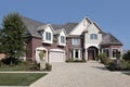 Luxury brick home with stone pillars Royalty Free Stock Photo