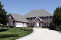 Luxury brick home with three car garage Royalty Free Stock Photo