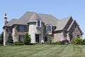 Luxury brick home with turret Royalty Free Stock Photo