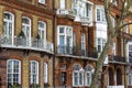 Luxury brick house with white windows in quiet area in central London. Apartments on the banks of the Thames Royalty Free Stock Photo