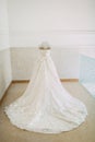 Luxury bridal dress on a mannequin. Artwork.