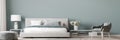 Luxury bright bedroom design, modern white bed and elegant home accessories on pastel blue wall background