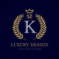 Luxury calligraphic letter K crown & key monogram logo Royalty Free Stock Photo