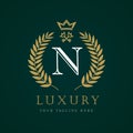 Luxury calligraphic letter N crown and key monogram logo Royalty Free Stock Photo