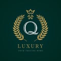 Luxury calligraphic letter Q crown key monogram logo Royalty Free Stock Photo