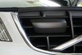 Luxury car adaptive cruise control radar installed on front grille