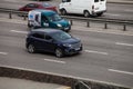 Luxury car blue Ford speeding on empty highway