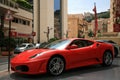 Luxury car Ferrari parked near store selling car